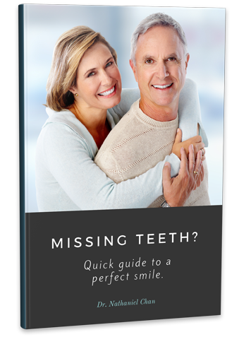 Book on Treating Missing Teeth with Dental Implants in Quincy & Norwell, MA